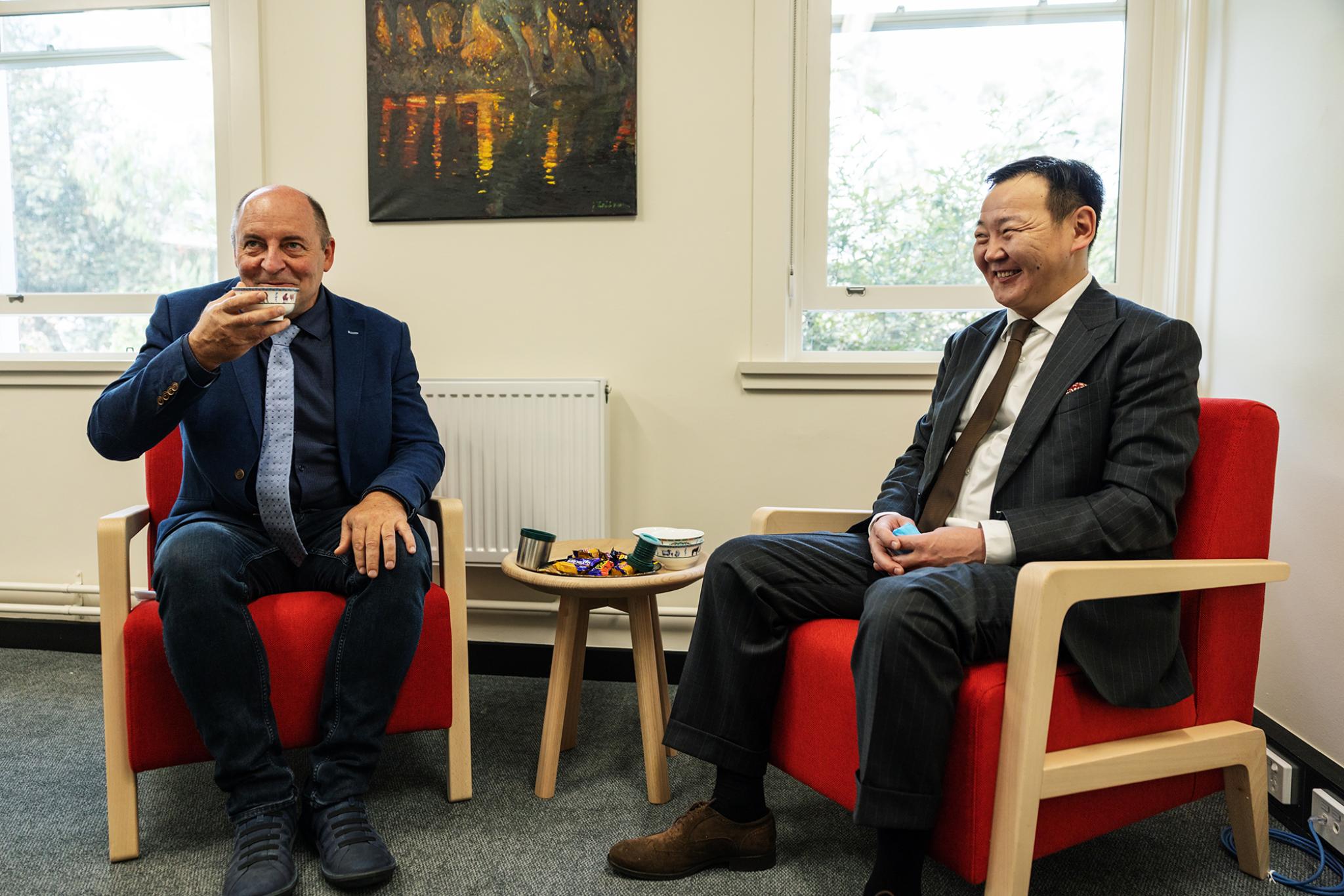 Professor Simon Haberle enjoying some Mongolian Tea with the delegates