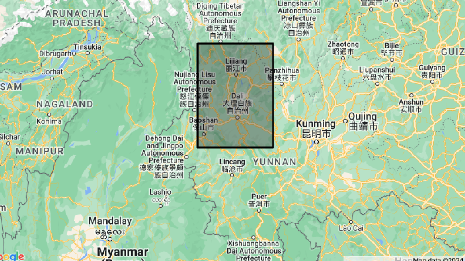 The location of Wuxing village in Heqing County where Kua'nsi is spoken.