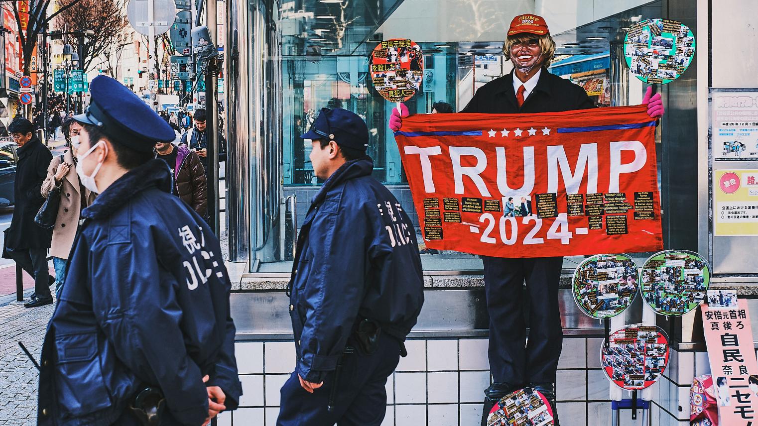 Protester stands outside Shibuya Station entrance in Tokyo, Japan. He promised me that slain Japanese prime minister Shinzo Abe’s ‘real’ assassin would be named if then presidential nominee Donald Trump won the American election.